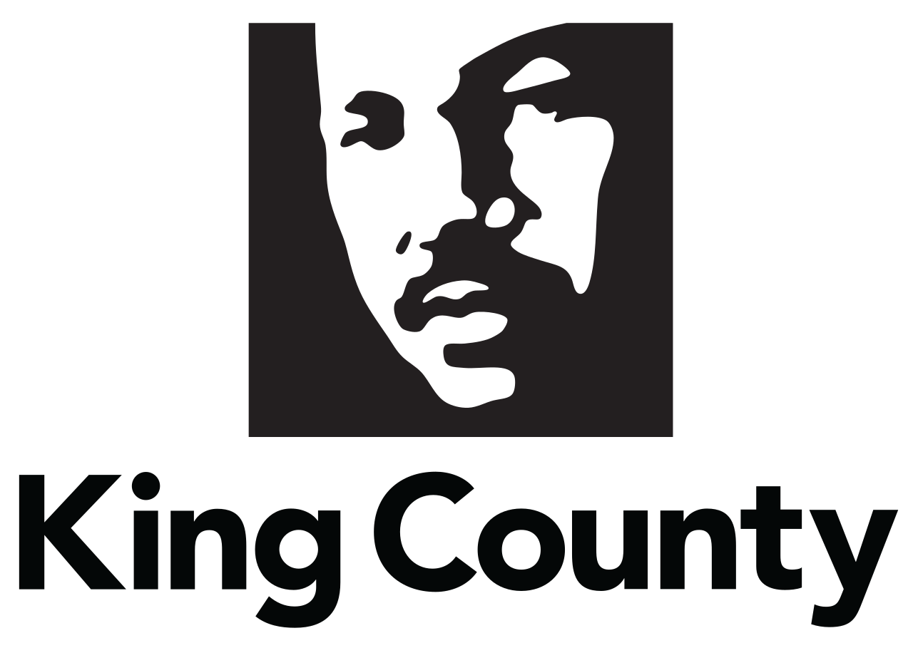 A black and white picture of a man 's face with the words " king county ".